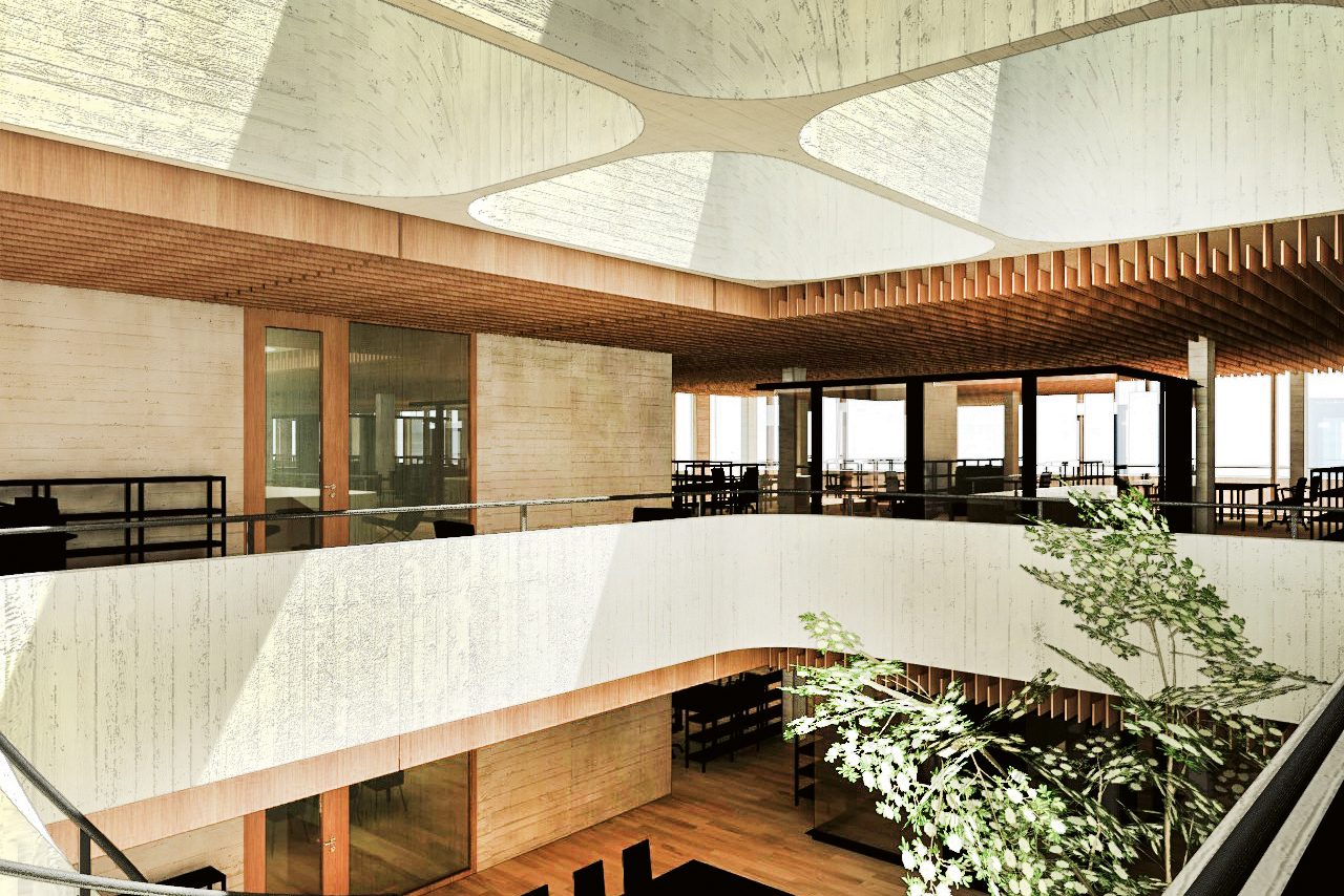 Das Atrium wirkt grosszügig und bietet informelle Kontaktmöglichkeiten.