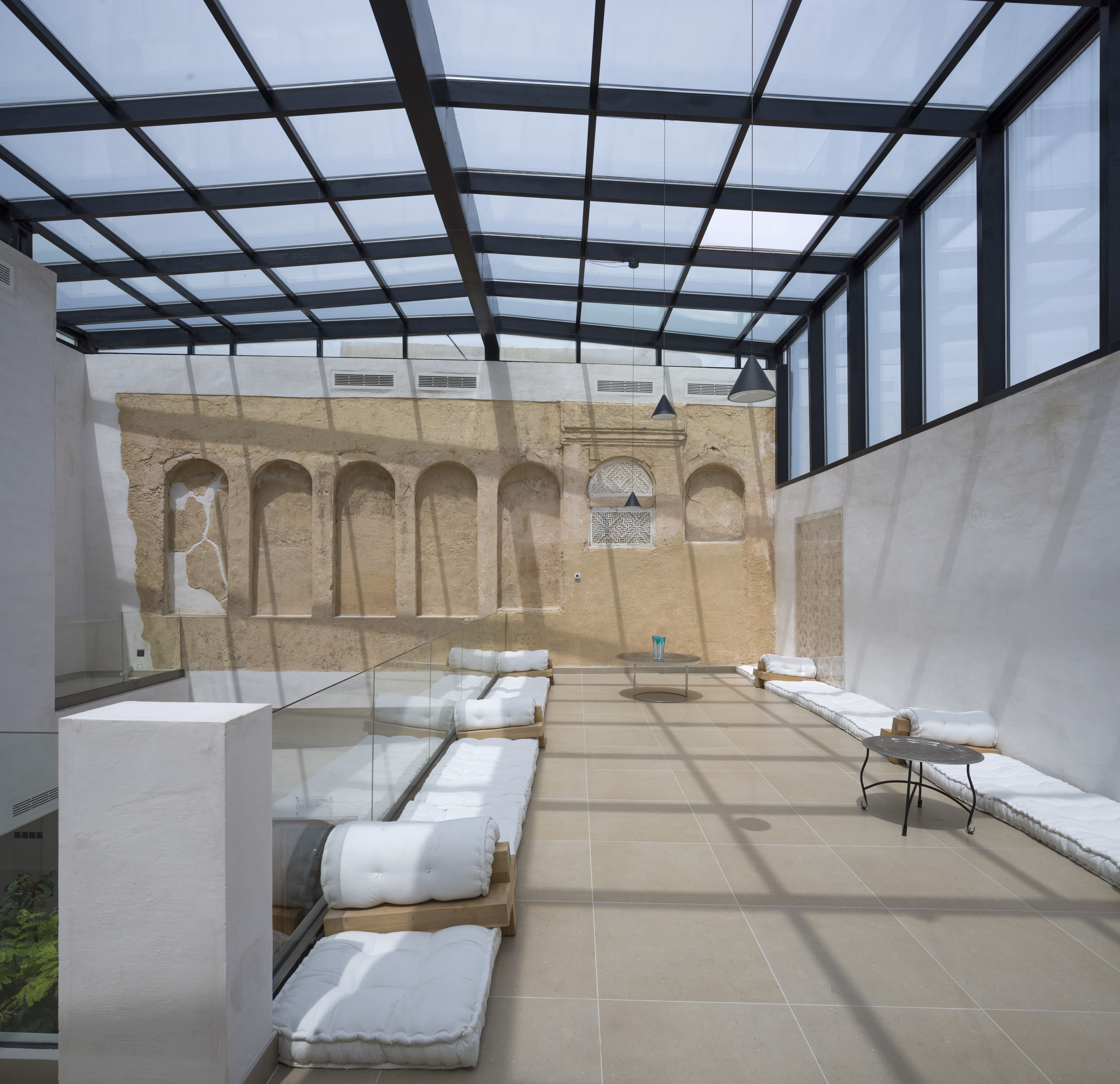 Interior of a 19th century wall in the courtyard of a 1940s building.