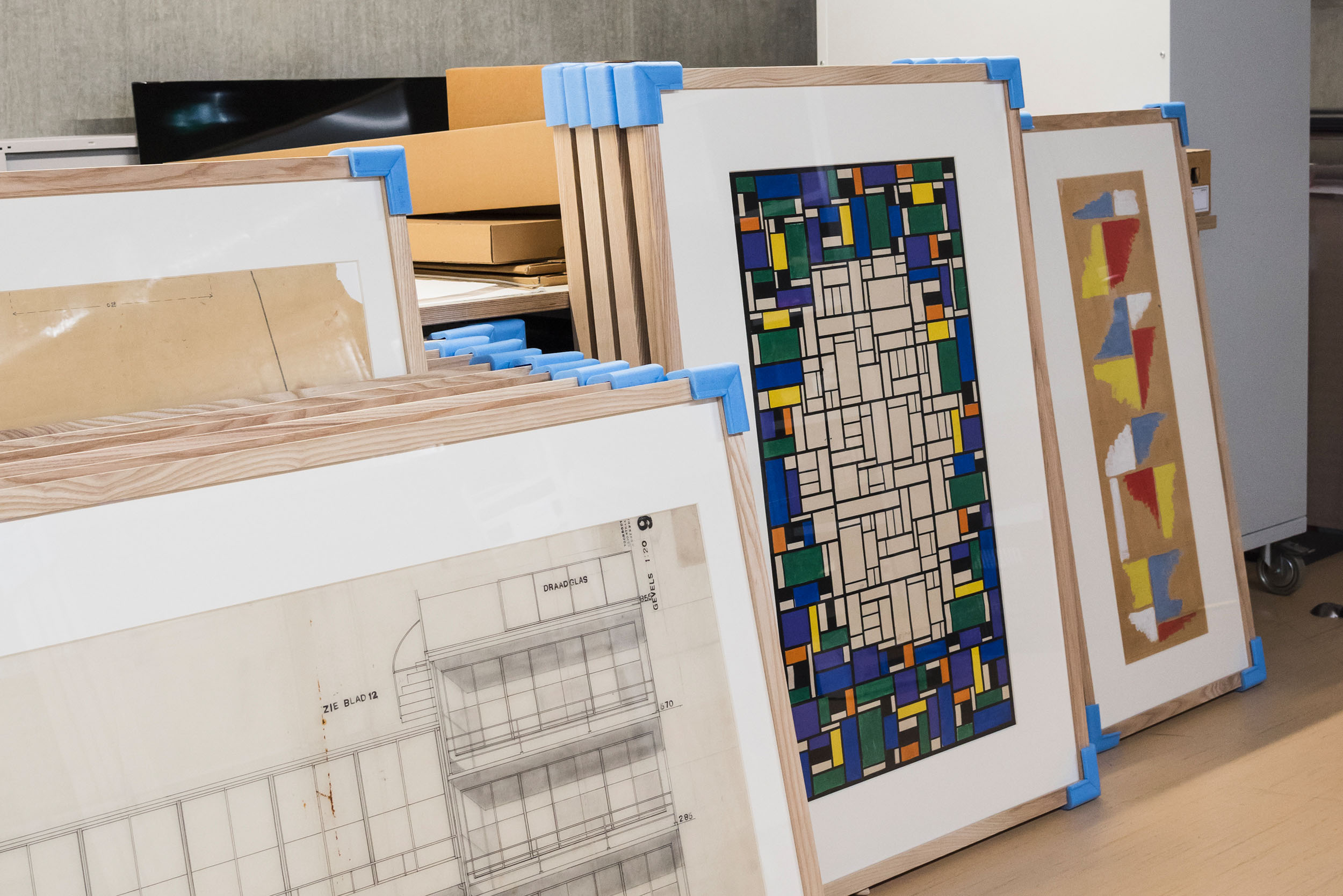Framed drawings ready for transport. In 2017, hundreds of pieces from the collection of Het Nieuwe Instituut were being loaned to other museums for exhibitions celebrating the centenary of De Stijl