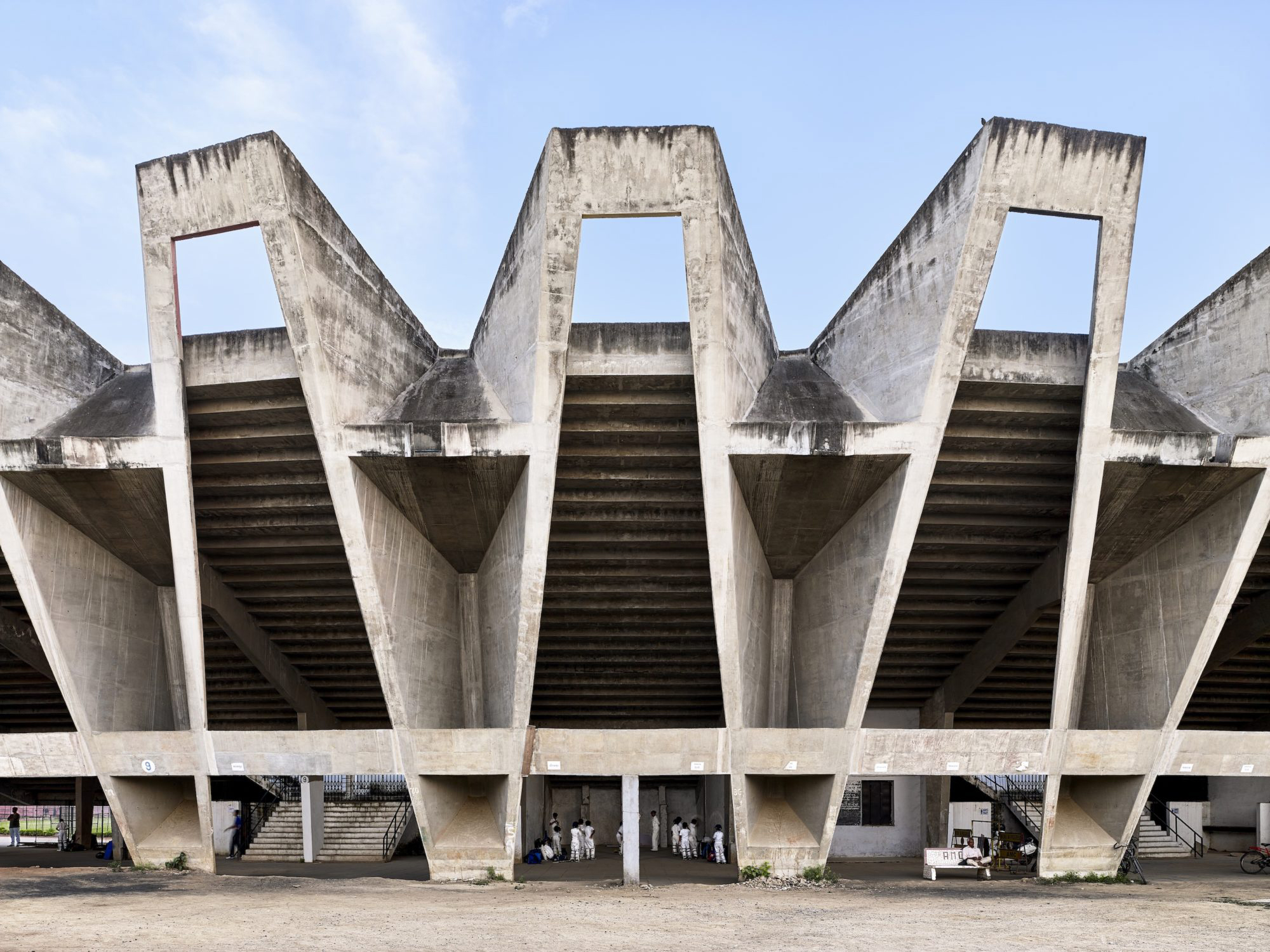Sardar Vallabhbhai Patel Municipal Stadium, Ahmedabad, India. 1959–1966. Architect: Charles Correa (1930–2015). Engineer: Mahendra Raj (b. 1924).