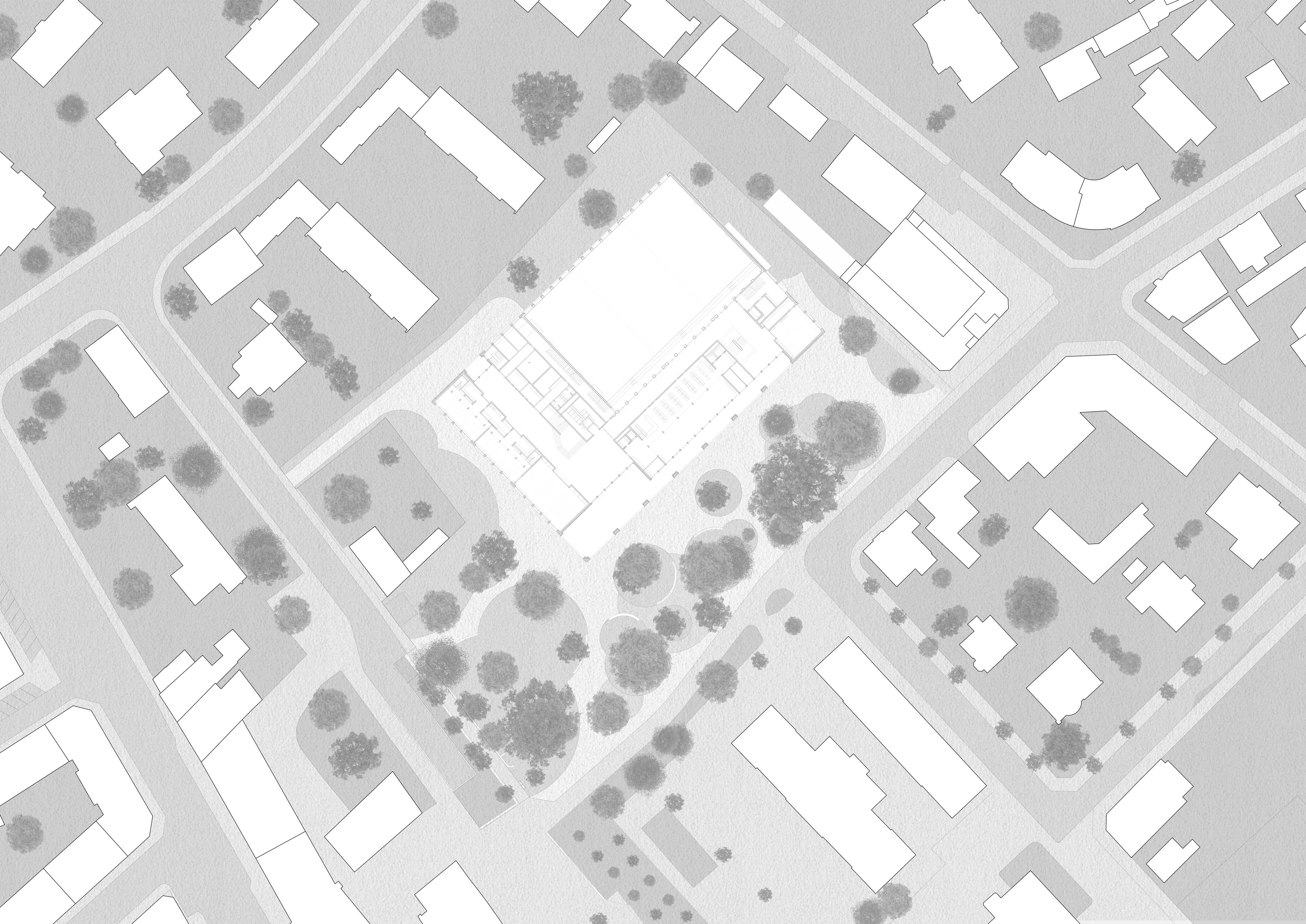 Collège Courbet: plan de situation, 1:1500. La position en retrait sur la parcelle et la forme compacte du bâtiment ont permis de traiter la voie menant du lac à la gare de la Tour-de-Peilz en un espace public de qualité, en préservant les grands arbres.