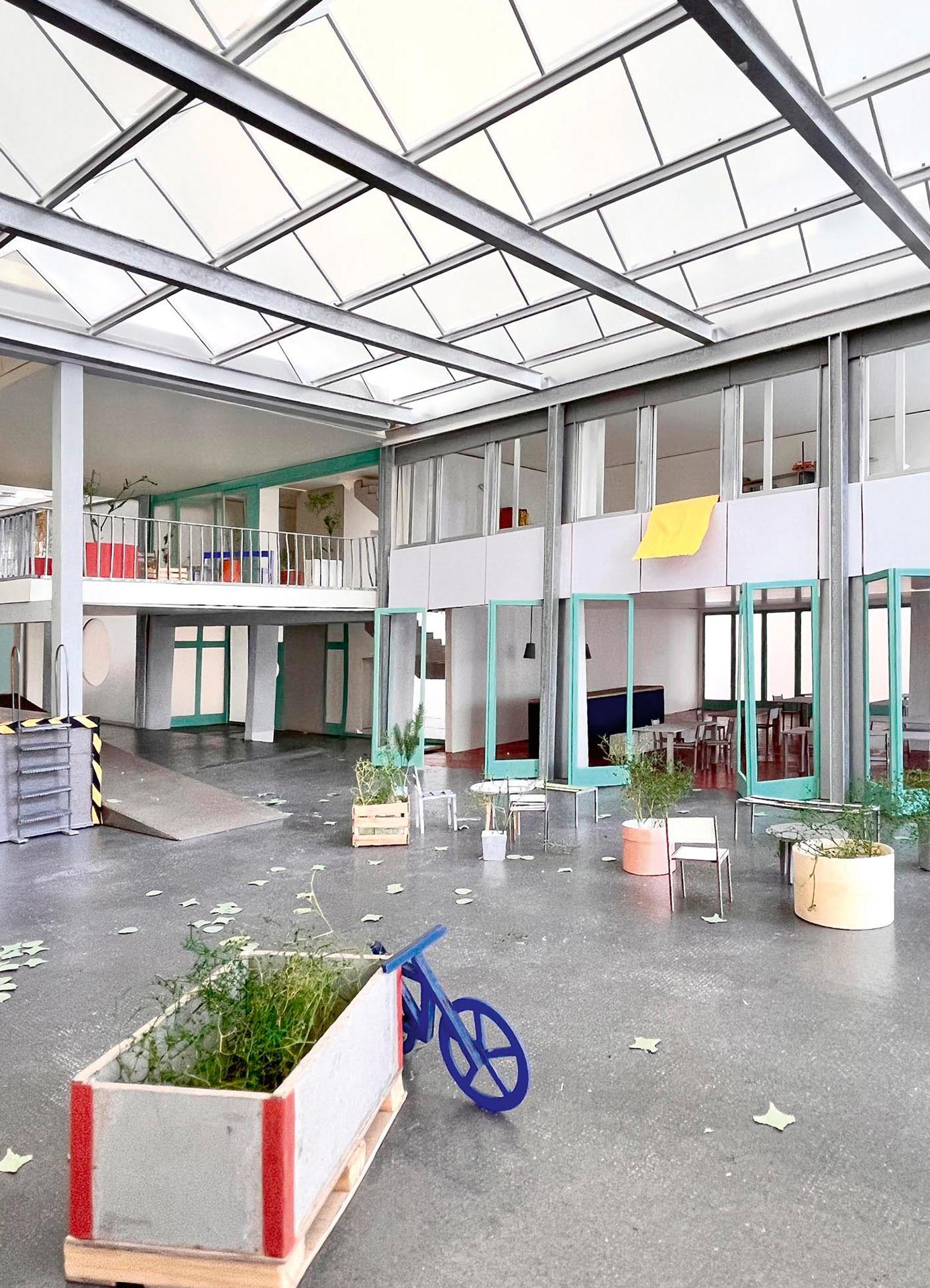 Der unbeheizte Zwischenbau des erstrangierten Projekts «ménage à trois» schafft einen gemeinschaftlichen Raum für die Wohnungen in den einstigen Bürohäusern.