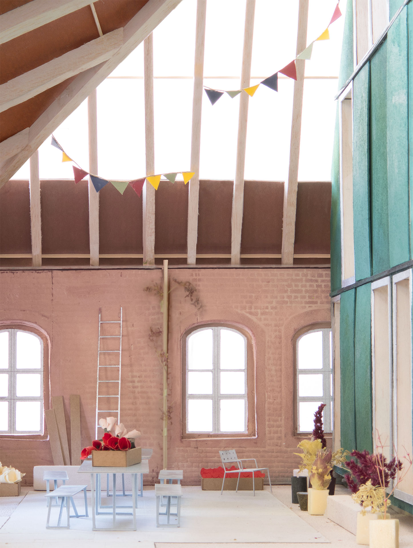 «Jean-Michel»: Ein gedeckter Aussenraum zwischen Kapelle und Zwischenbau steht für vielerlei Nutzungen bereit.