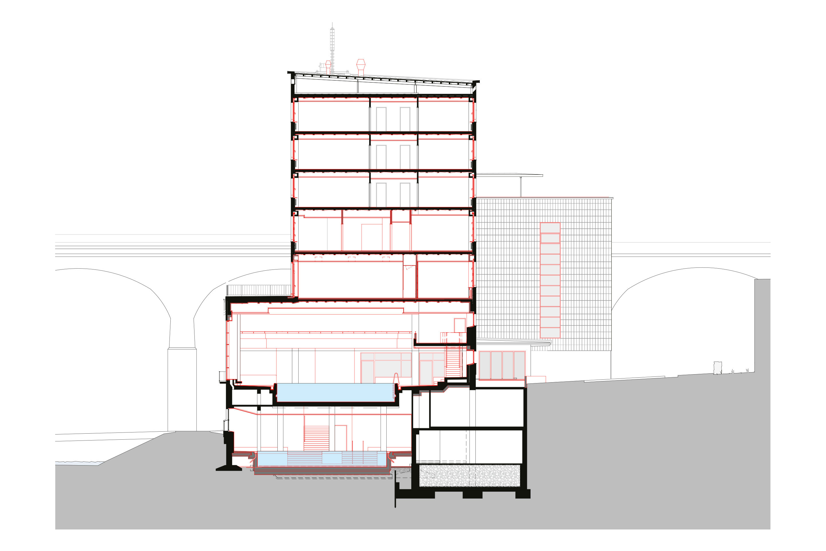The building connects to the viaduct and links the two city levels – the viaduct and the river area – with a continuous staircase.