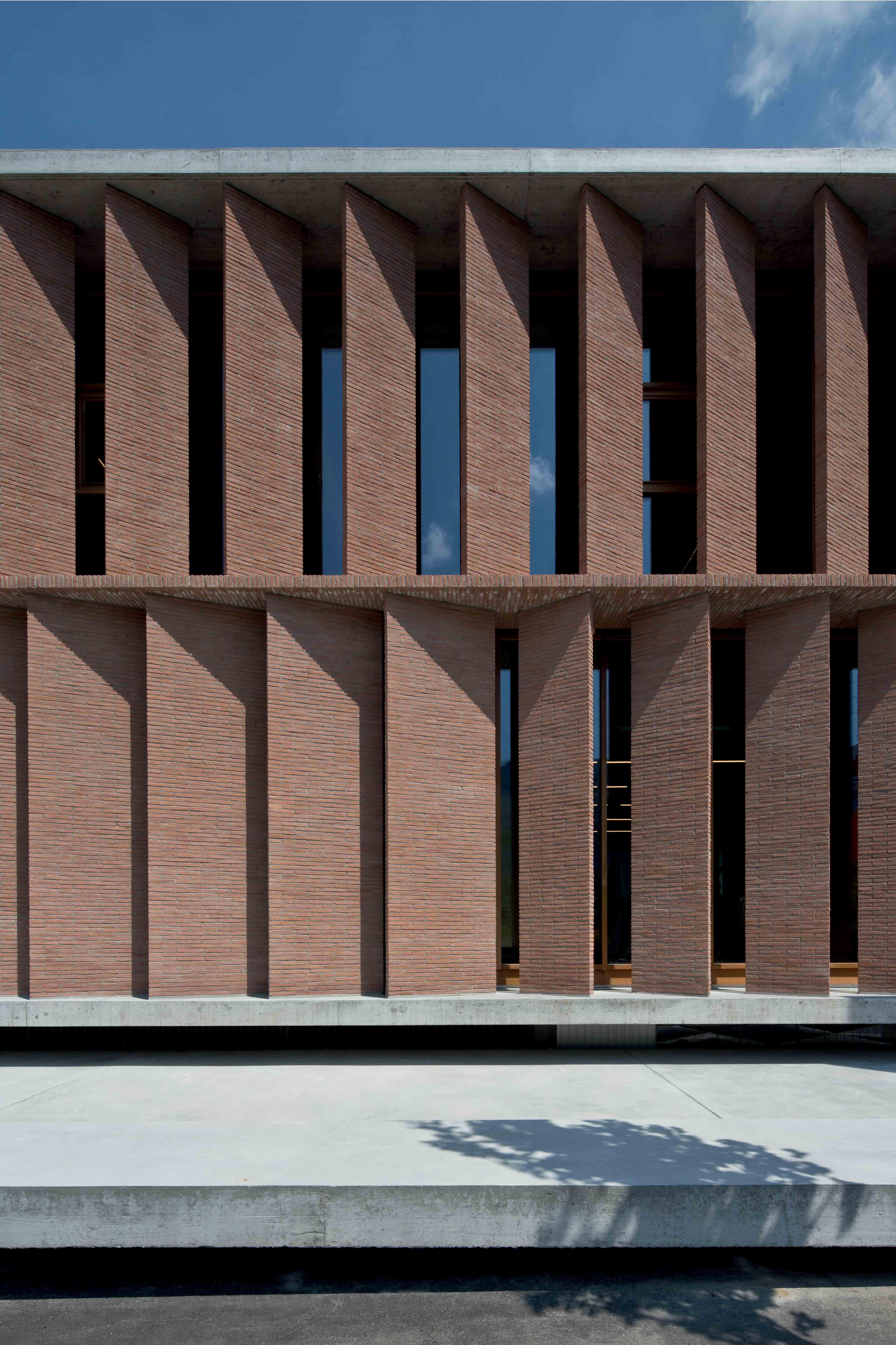 Centro commerciale e amministrativo, Melano. Baserga Mozzetti architetti.