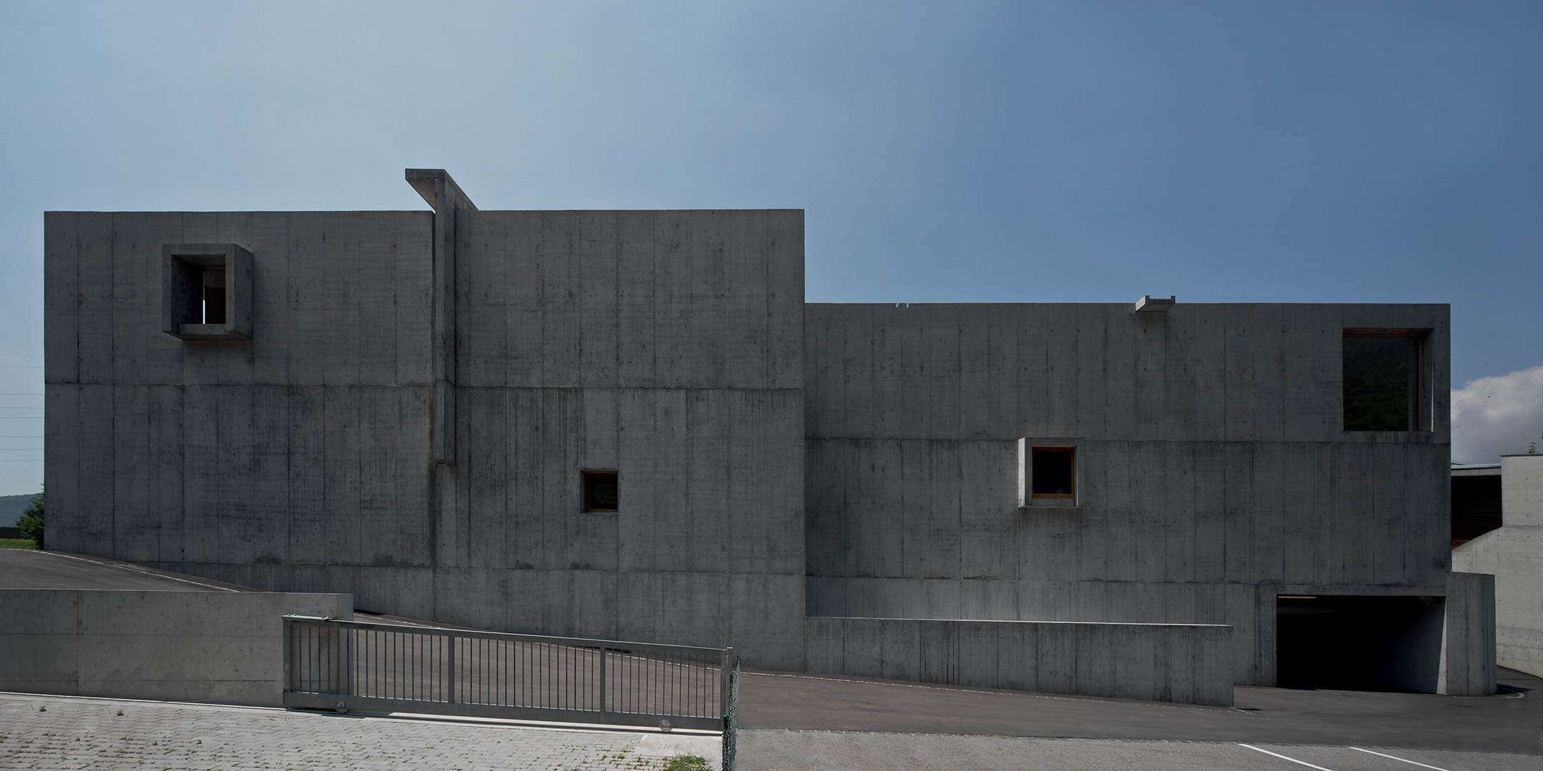 Centro commerciale e amministrativo, Melano. Baserga Mozzetti architetti.