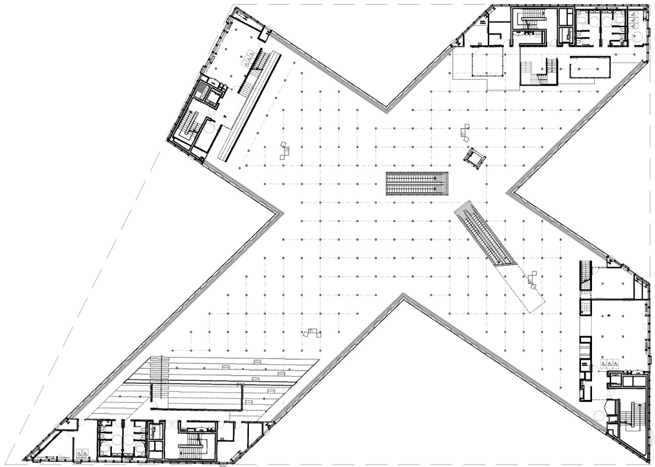 Le plan du grand plateau de la bibliothèque : les postes informatiques des différents pôles peuvent être librement distribués, grâce aux boitiers de sol encastrés dans la chape béton et répartis de manière homogène sur l’ensemble de l’étage.