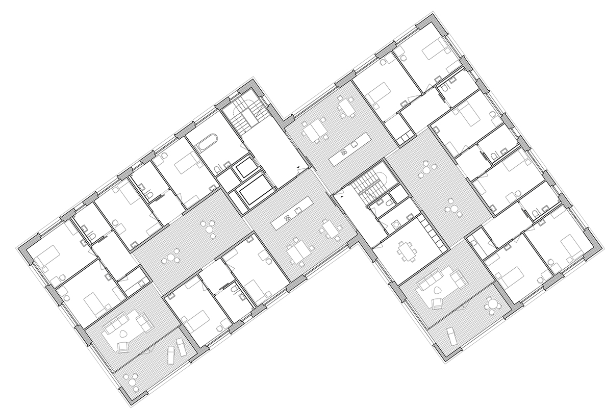 «Stubete», Grundriss Regelgeschoss Wohngruppen. Auf jedem Geschoss ist eine Wohngruppe untergebracht. Die beiden Wohn­küchen liegen an der Nahtstelle zwischen den Gebäuden und können bei Bedarf zusammengelegt werden. Der dabei entstehende Z-förmige Raum ist wegen der fest installierten Kochinseln allerdings nur bedingt flexibel nutzbar.