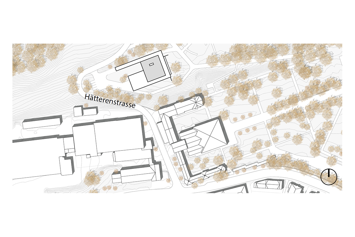 Situation. Der Neubau liegt am westlichen Rand des Friedhofs Feldli, direkt unterhalb des Altbaus. Auf der anderen Strassenseite schliesst ein Industriegebiet an.