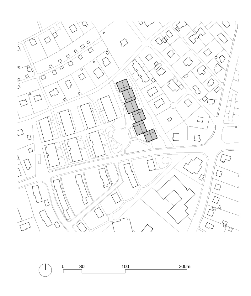 2 Plan de situation. Les logements coopératifs sont situés au bord d’un vaste quartier de villas.